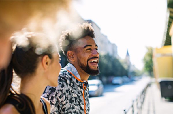 Man smiling with friends